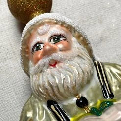 Wiktoria Holiday Santa On Chair Tree Topper